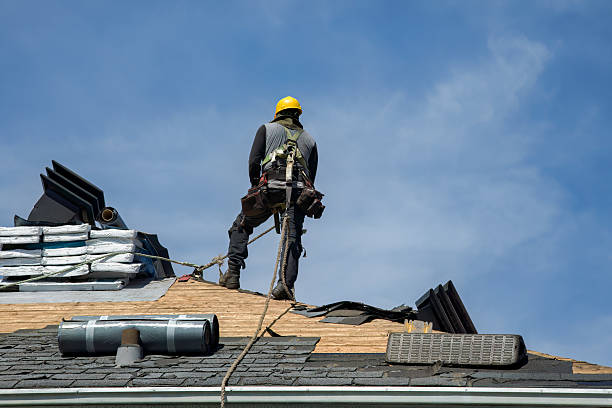 Professional Roofing technician working in Gowrie, IA